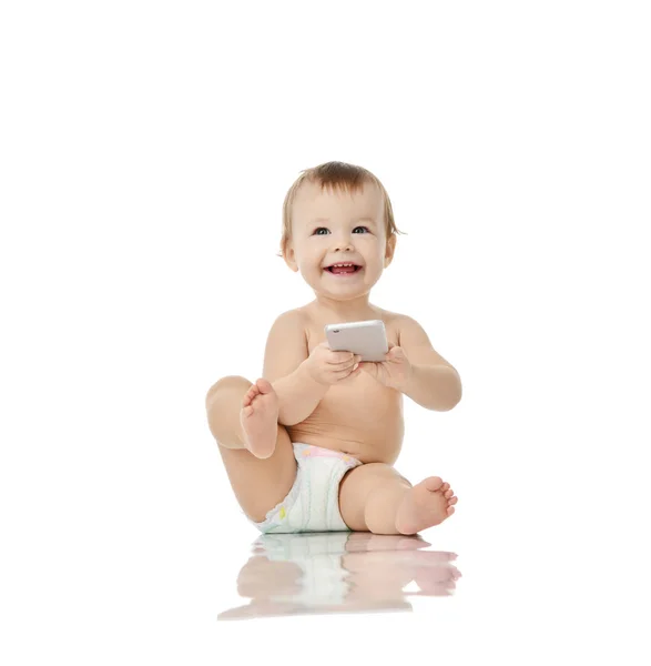Infant child baby girl toddler playing with mobile cellphone happy smiling — Stock Photo, Image