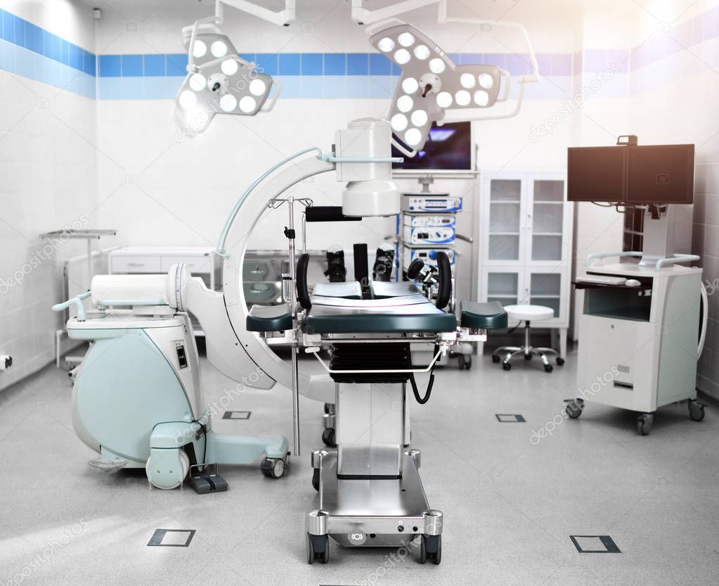 Background of modern operating room at medical hospital interior with the anesthesiology machine equipment