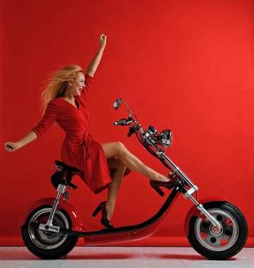 Woman ride new electric car motorcycle bicycle scooter bike red dress  surprised clipart