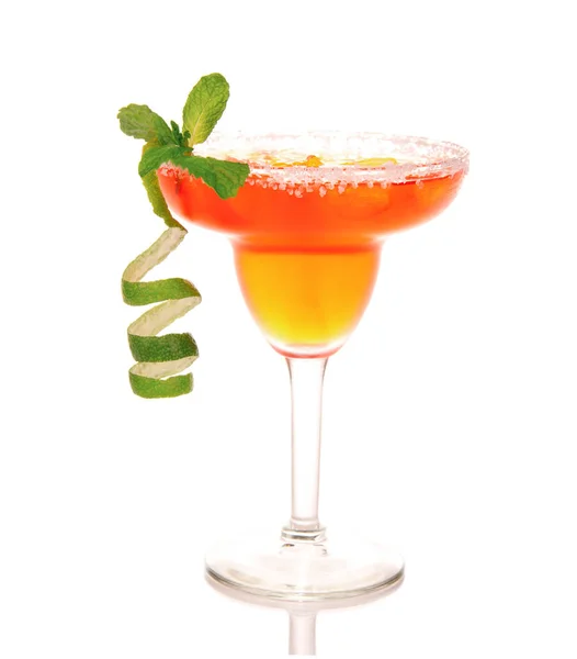 Red margarita cocktail with strawberry fruit in chilled salt rimmed glass and tequila orange syrup, fresh mint and lime spiral Stock Picture