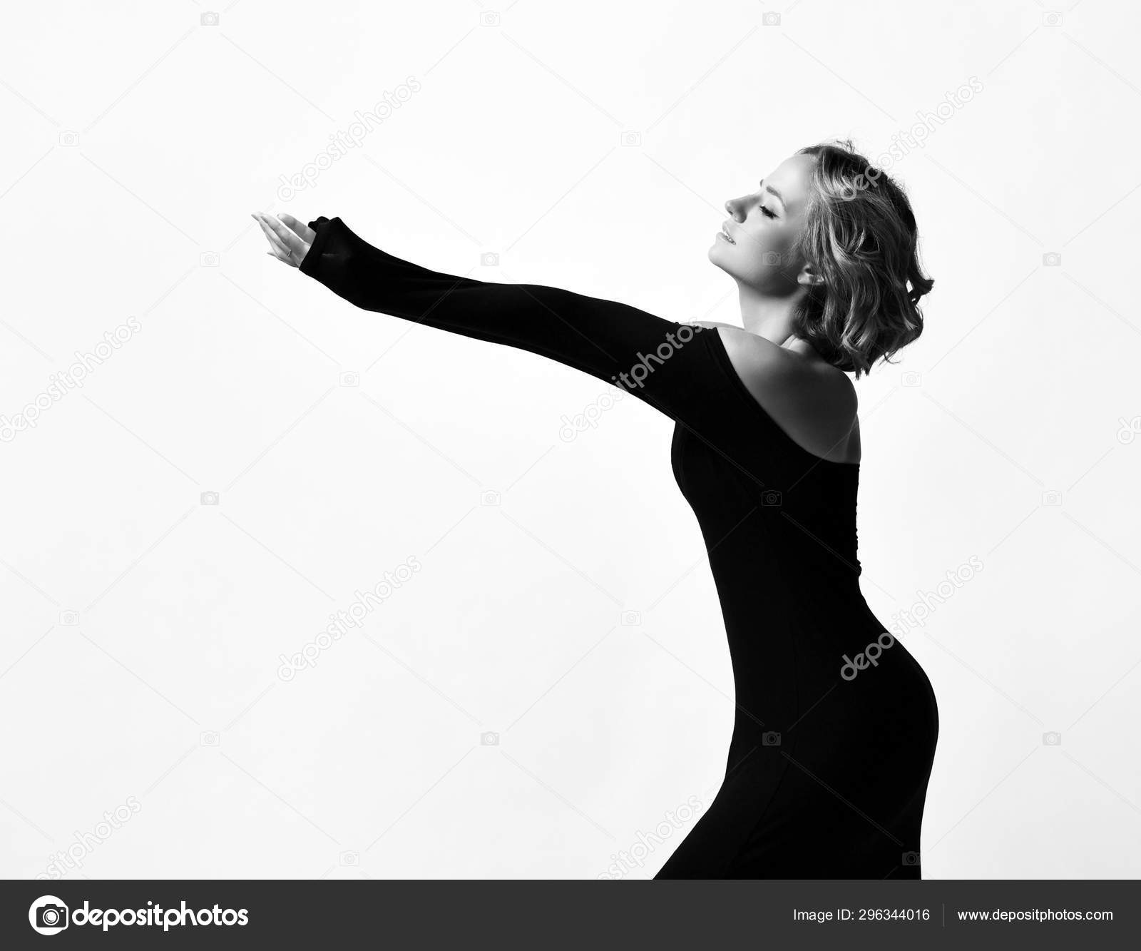 Young Woman Actress With Curly Blonde Hair In Light Black Dress