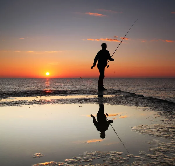Fisherman at sunrise