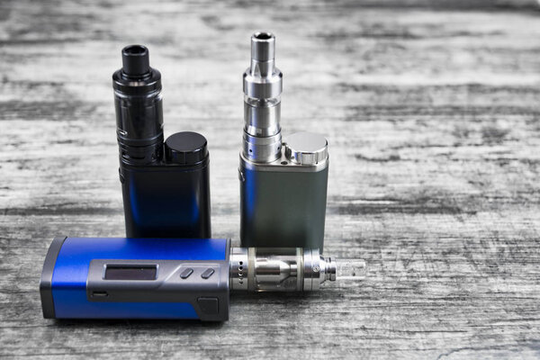 E - cigarette for vaping , technical devices.The liquid in the bottle