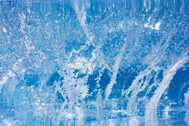 Donmuş buz kış gölde bir desen ile doku. Noel için kış arka plan