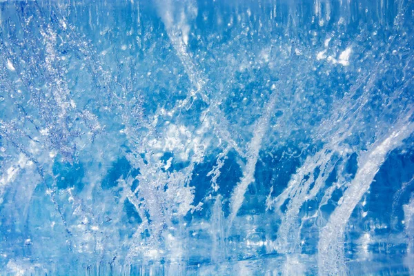 Donmuş buz kış gölde bir desen ile doku. Noel için kış arka plan