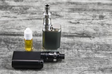 Elektronik Sigara vaping, teknik cihazlar için. Sıvı şişe. Geçerli, damla.