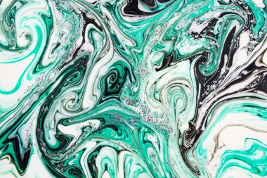 Yeşil ve siyah mermer soyut güzel desen. Su ile akrilik Ebru boyama Doğu tarzı swirls boyar. Renklerin, hakiki lüks şık karışımı  