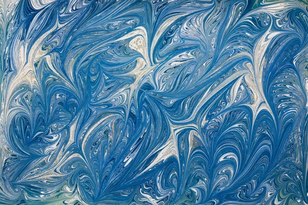 美丽的抽象绘画技术在蓝色的 Ebru 土耳其风格的绘画埃布鲁在水面上与丙烯酸油漆漩涡波 自然奢华的时尚结合 图库图片