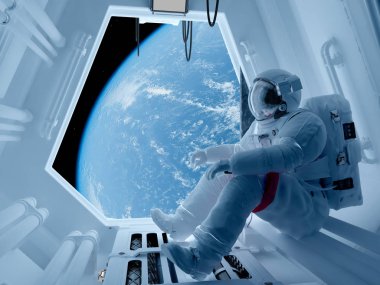 Astronot. içinde oturan