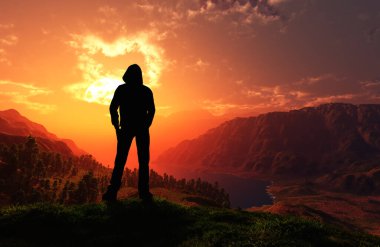 Gün batımında bir turistin silueti.