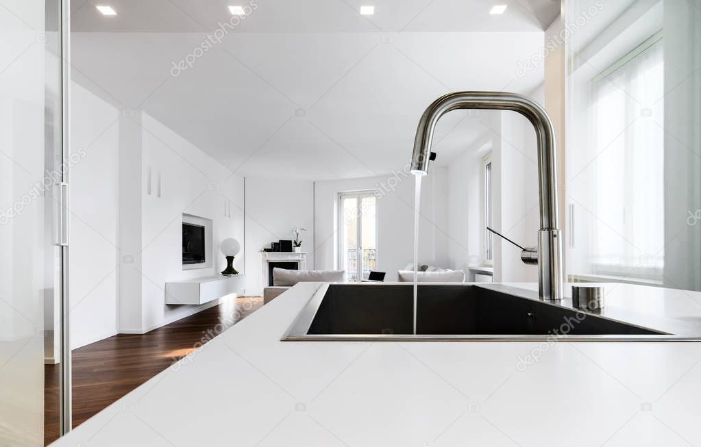 modern kitchen interiors in the foreground the integrated sink