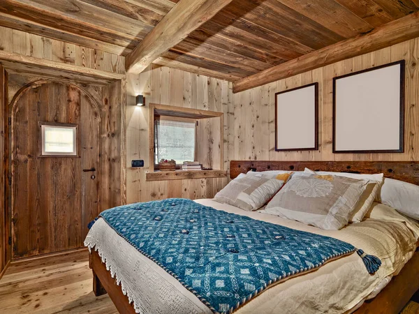 interior shot a rustic bedroom  with wood ceiling and wood walls on the background the wood door