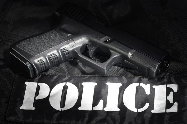Arma Attrezzature Della Polizia Sfondo Uniforme Nero — Foto Stock