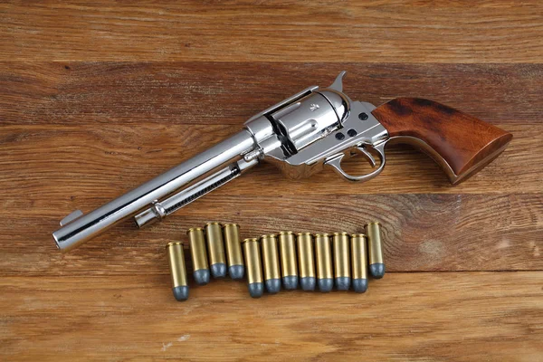 Vahşi Batı Revolver Colt Tek Aksiyon Ordu Ahşap Arka Plan — Stok fotoğraf
