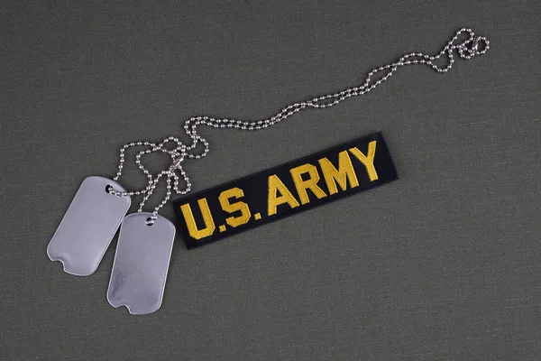 美国陆军支队磁带与狗标签橄榄绿色制服背景 — 图库照片