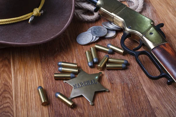 Wild west gun, ammunition and U.S. Marshal Badge — Stock Photo, Image