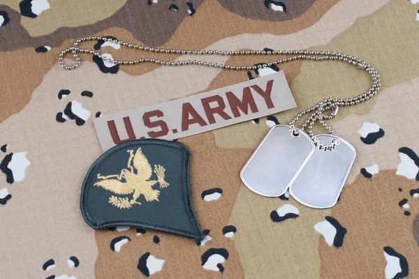 US ARMY battle dress uniform with dog tags and rank patch — Stock Photo, Image