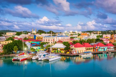 St. John's, Antigua and Barbuda town skyline on Redcliffe Quay at dusk. clipart
