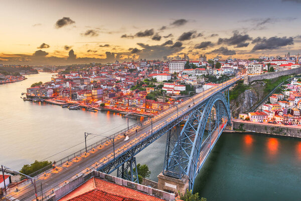 Porto, Portugal Skyline over Dom Luis I Bridge and Douro River.