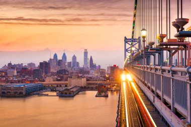 Philadelphia, Pennsylvania, USA downtown skyline from the Benjamin Franklin Bridge. clipart