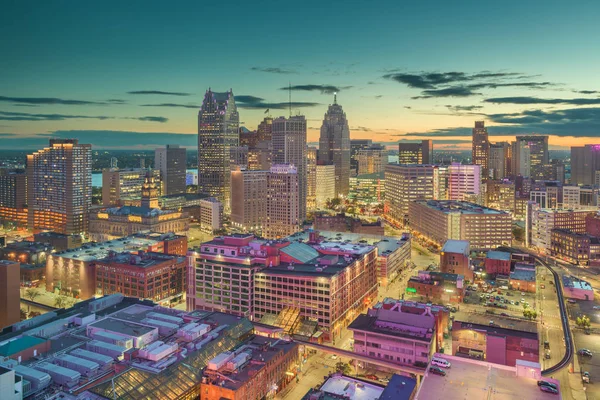 Detroit, Michigan, USA downtown skyline from above at dusk.