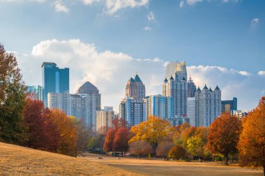 Atlanta, Georgia, USA midtown skyline from Piedmont Park in autumn in the afternoon. clipart