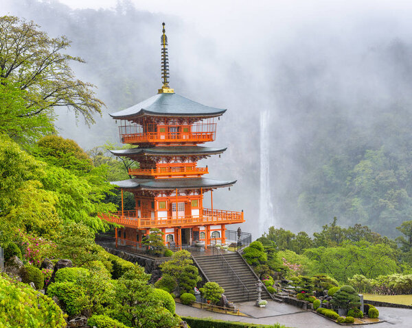 Nachi, Japan at Kumano Nachi Taisha Pagoda and waterfall on a misty day. 