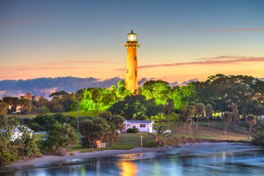 Jupiter, Florida, USA with Jupiter Inlet Light at dawn. clipart