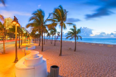 Fort Lauderdale, Florida, USA beach and life guard tower at sunrise. clipart