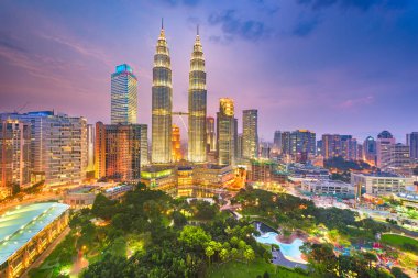 Kuala Lumpur, Malaysia park and skyline clipart
