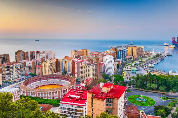 Malaga, Spain dawn skyline towards the Mediterranean Sea. — Stock Photo, Image