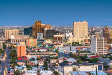 El Paso, Texas, USA  downtown city skyline at dusk with Juarez, Mexico in the distance. clipart