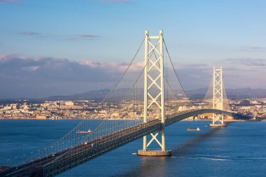Akashi Kaikyo Bridge spanning the Seto Inland Sea from Kobe, Japan. clipart