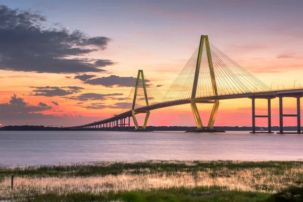 Charleston, South Carolina, USA at Arthur Ravenel Jr. Bridge at dusk.
