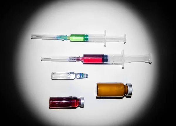 Medical Glass Bottle Ampoules Plastic Medical Syringes Filled Red Green — Stock Photo, Image