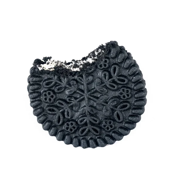 Black round cookies bite on top, isolated, close-up — Stock Photo, Image