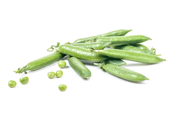 Green peas in pods on a white background — Stock Photo, Image