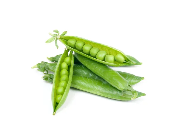 Green peas in pods on a white background — Stock Photo, Image