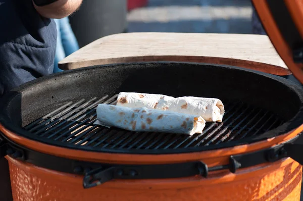 Grilled fast food, appetizer wrapped in pita bread — Stock Photo, Image