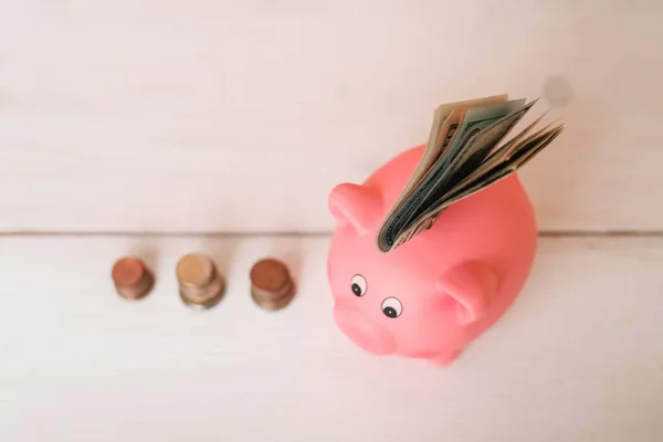 Little Cute Pink Pig Piggy Bank Wooden Table Three Piles — Stock Photo, Image