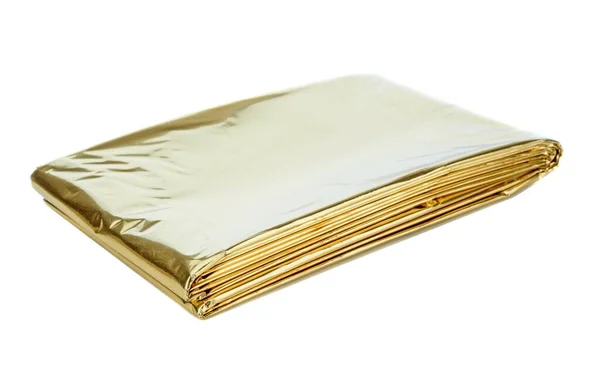 Ett Gyllene Aluminium Folie Nödsituation Första Hjälpen Kit Värmeplåt Vit — Stockfoto