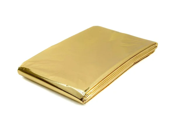Een Gouden Aluminium Folie Ehbo Kit Warmtevel Een Witte Achtergrond — Stockfoto