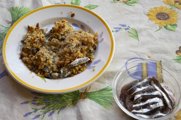 Ingredienser för gratinerade ansjovisfritöser — Stockfoto