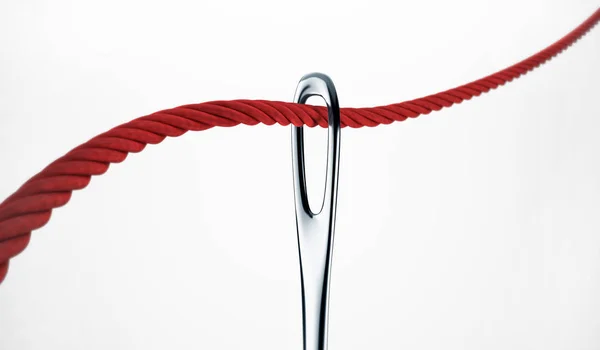 Rode draad en een naald geïsoleerd op wit met clipping pad. 3d — Stockfoto