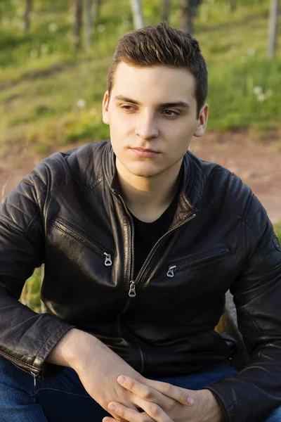 Beautiful Young Confident Man Leather Jacket Sits Next Hills — Stock Photo, Image