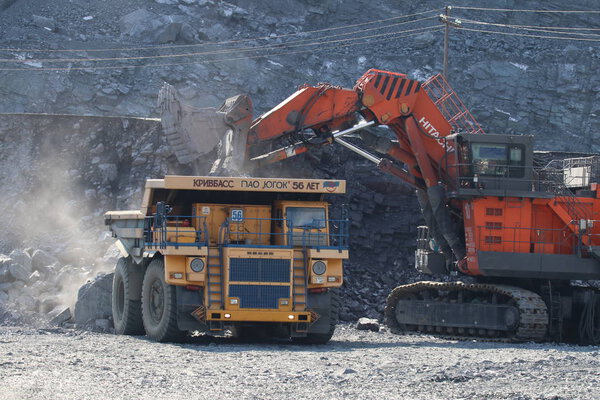 Technique in iron ore quarries. BelAZ