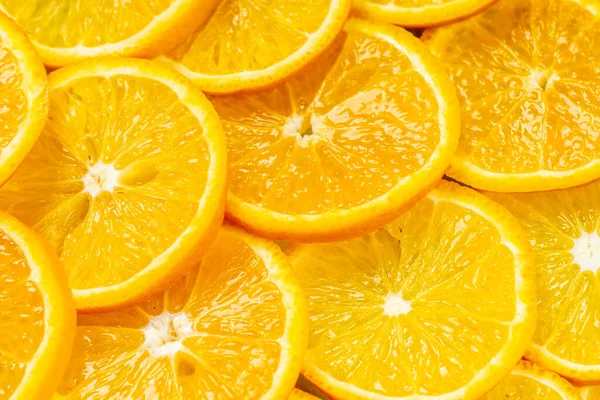 Egy csomó narancs szeletek a teljes képet — Stock Fotó