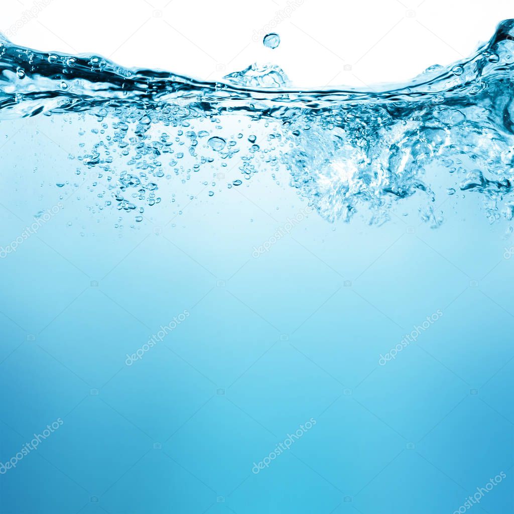 Water and air bubbles over white background