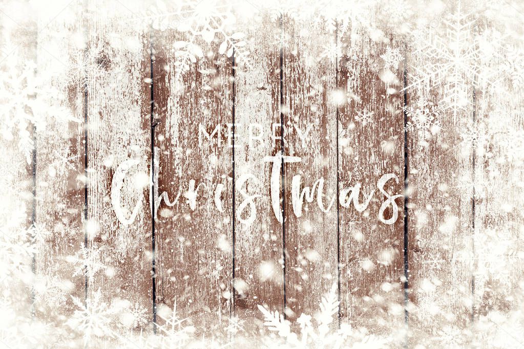 The brown wood texture with snow flakes over it. Winter christmas background