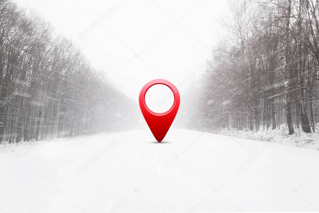 Road in winter snow covered forest with 3d red location pin